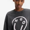 Cotton-jersey T-shirt with melted-effect Happy HUGO print