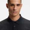 Cotton-piqué polo shirt with all-over print Cotton-piqué polo shirt with all-over print