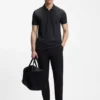 Cotton-piqué polo shirt with all-over print Cotton-piqué polo shirt with all-over print