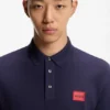 Cotton-piqué slim-fit polo shirt with red logo label