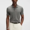 Cotton polo shirt with herringbone structure Cotton polo shirt with herringbone structure
