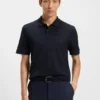 Cotton polo shirt with herringbone structure Cotton polo shirt with herringbone structure