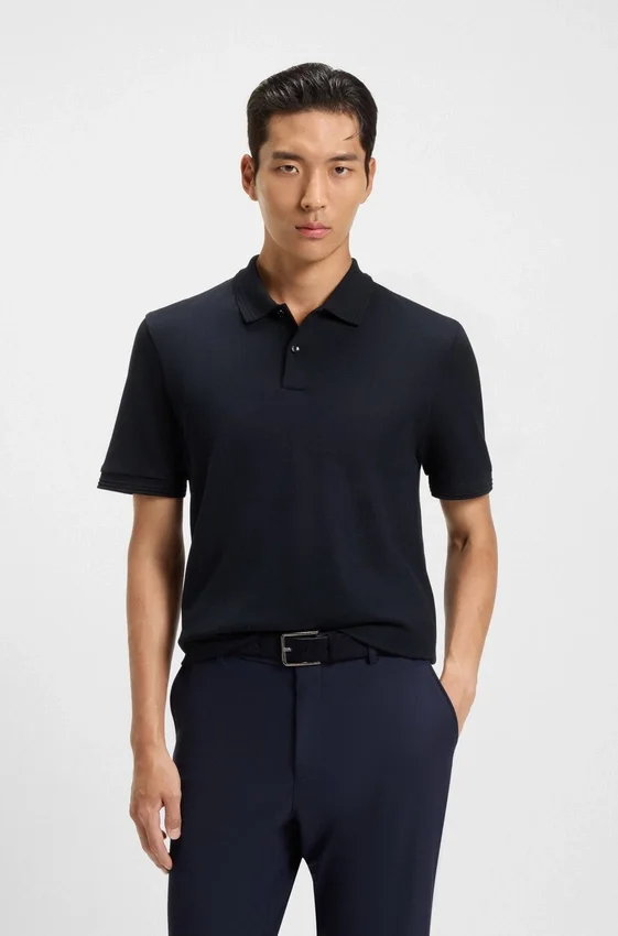 Cotton polo shirt with herringbone structure Cotton polo shirt with herringbone structure