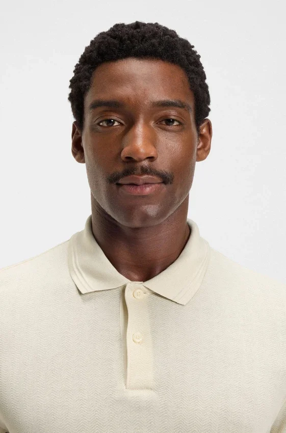 Cotton polo shirt with herringbone structure Cotton polo shirt with herringbone structure