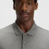 Cotton polo shirt with herringbone structure Cotton polo shirt with herringbone structure
