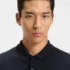 Cotton polo shirt with herringbone structure Cotton polo shirt with herringbone structure
