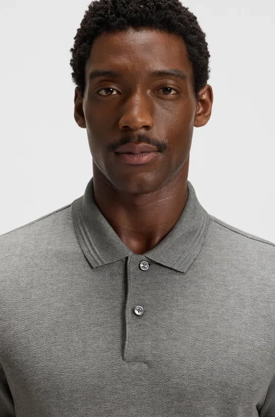 Cotton polo shirt with herringbone structure Cotton polo shirt with herringbone structure