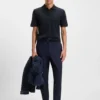 Cotton polo shirt with herringbone structure Cotton polo shirt with herringbone structure