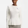 Cotton sweater with detachable floral brooch