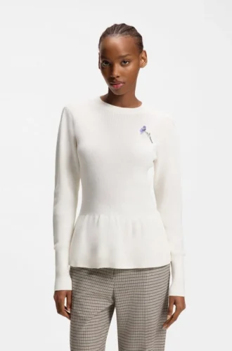 Cotton sweater with detachable floral brooch