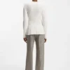 Cotton sweater with detachable floral brooch
