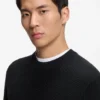 Cotton sweater with knitted structure
