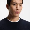 Cotton sweater with knitted structure