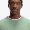 Cotton sweater with knitted structure