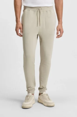 Cotton-terry sweatpants with logo patch