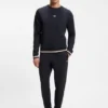 Cotton-terry tracksuit bottoms with signature stripes and logo