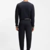 Cotton-terry tracksuit bottoms with signature stripes and logo