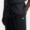 Cotton-terry tracksuit bottoms with signature stripes and logo