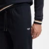 Cotton-terry tracksuit bottoms with signature stripes and logo