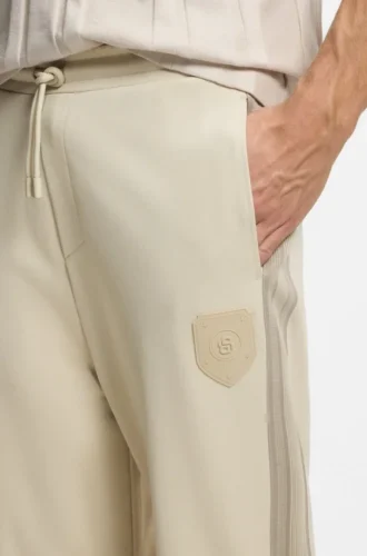 Crest-logo tracksuit bottoms in a regular fit Crest-logo tracksuit bottoms in a regular fit