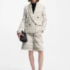 Cropped relaxed-fit trousers in striped cotton-blend tweed Cropped relaxed-fit trousers in striped cotton-blend tweed