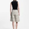 Cropped relaxed-fit trousers in striped cotton-blend tweed Cropped relaxed-fit trousers in striped cotton-blend tweed