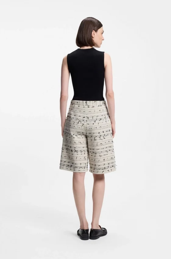 Cropped relaxed-fit trousers in striped cotton-blend tweed Cropped relaxed-fit trousers in striped cotton-blend tweed