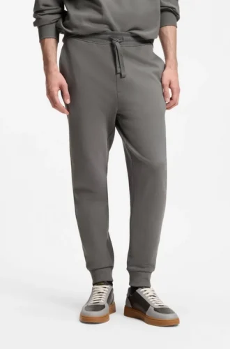 Cuffed sweatpants in cotton terry with logo print