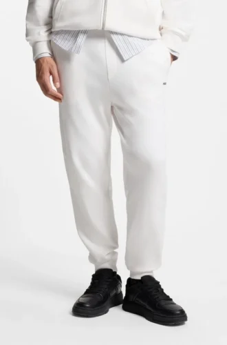 Cuffed sweatpants in cotton terry with logo print Cuffed sweatpants in cotton terry with logo print