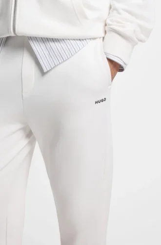 Cuffed sweatpants in cotton terry with logo print Cuffed sweatpants in cotton terry with logo print