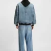 Denim bomber jacket with jersey layer