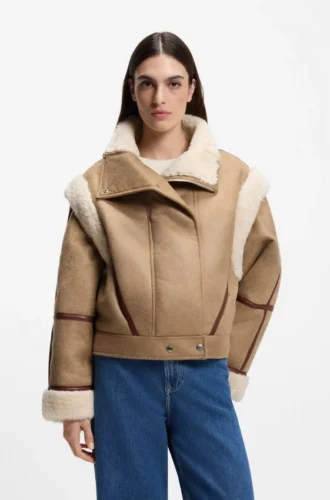 Detachable-sleeve jacket in faux shearling