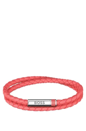 Double-braided cuff with magnetic logo closure