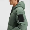 Down-filled long jacket with water-repellent finish