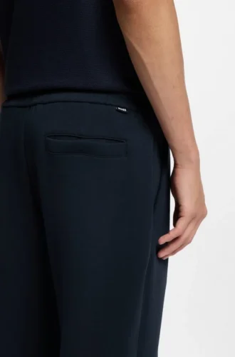 Drawcord-waist trousers in a regular fit