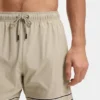 Drawstring swim shorts in stretch fabric with tape trim