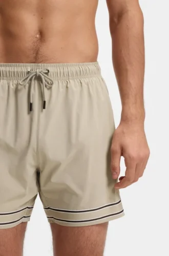 Drawstring swim shorts in stretch fabric with tape trim