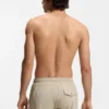 Drawstring swim shorts in stretch fabric with tape trim