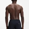 Drawstring swim shorts in stretch fabric with tape trim
