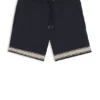 Drawstring swim shorts in stretch fabric with tape trim