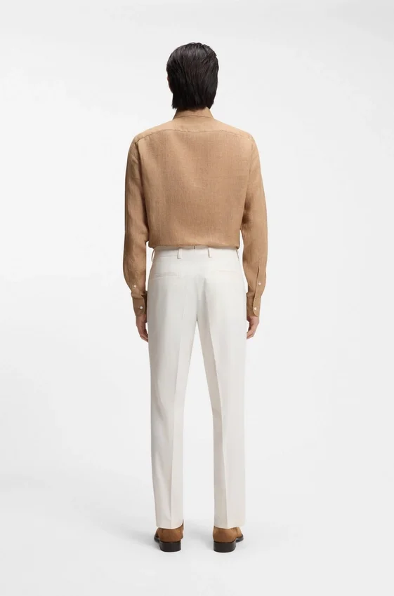 Easy-iron tapered-fit trousers in stretch-cotton poplin Easy-iron tapered-fit trousers in stretch-cotton poplin