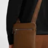 Embossed-logo envelope bag in Italian leather Embossed-logo envelope bag in Italian leather