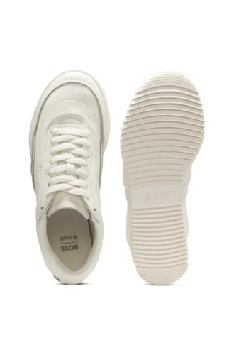 Embossed-logo trainers in leather