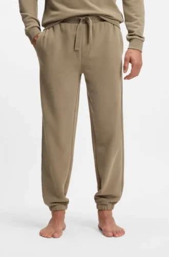 Embroidered-logo tracksuit bottoms in cotton terry