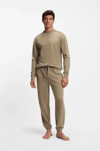 Embroidered-logo tracksuit bottoms in cotton terry