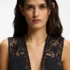 Embroidered waistcoat with tie closure