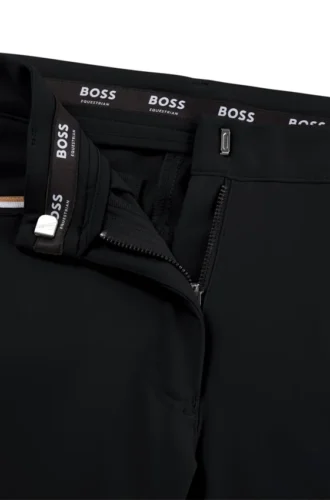 Equestrian knee-grip breeches in power-stretch material