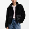 Faux fur coat with contrasting patch pockets