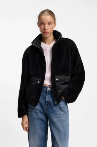 Faux fur coat with contrasting patch pockets
