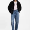 Faux fur coat with contrasting patch pockets